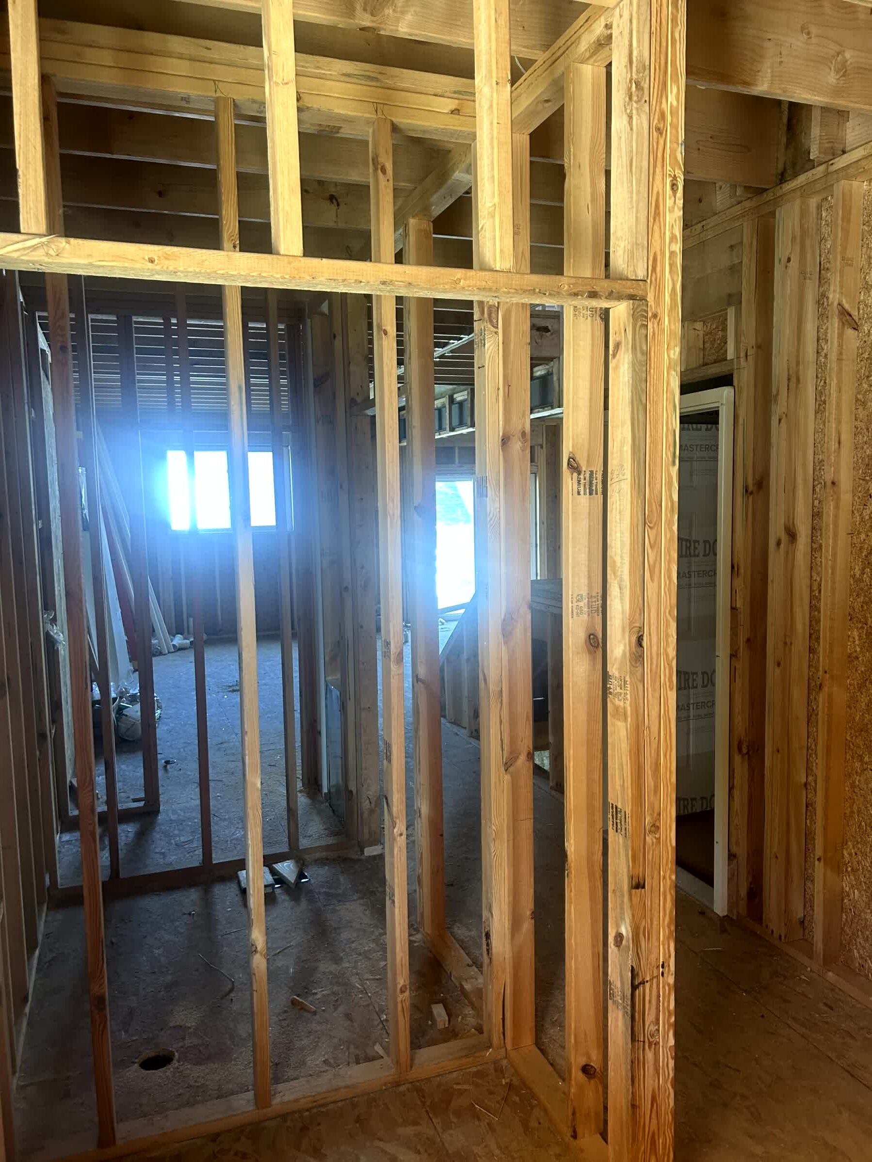 Main level interior framing with natural sunlight